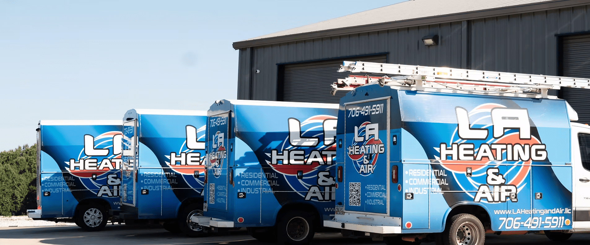 LA Heating & Air fleet of service trucks ready for residential and commercial HVAC services